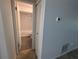 Hallway with access to bathroom and closet at 2912 S Semoran Blvd # 9, Orlando, FL 32822