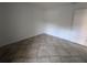 Simple bedroom with tile flooring and a closet at 2912 S Semoran Blvd # 9, Orlando, FL 32822
