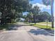 Quiet tree-lined road leads through the community at 2912 S Semoran Blvd # 9, Orlando, FL 32822