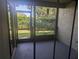 Screened patio overlooking the backyard at 2912 S Semoran Blvd # 9, Orlando, FL 32822