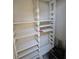 White built-in shelving unit for ample storage at 2912 S Semoran Blvd # 9, Orlando, FL 32822