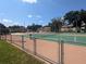 Tennis courts near pool and building at 2912 S Semoran Blvd # 9, Orlando, FL 32822