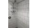 Shower stall with tiled walls and a shower head at 2912 S Semoran Blvd # 9, Orlando, FL 32822