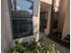 Exterior view showing pathway and entrance to condo building at 2912 S Semoran Blvd # 9, Orlando, FL 32822