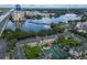 Aerial view of condo community near lake with tennis courts at 127 Oyster Bay Cir # 110, Altamonte Springs, FL 32701