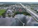 Aerial view of condo complex with lake access and highway nearby at 127 Oyster Bay Cir # 110, Altamonte Springs, FL 32701