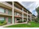 Ground level condo building showcasing landscaping at 127 Oyster Bay Cir # 110, Altamonte Springs, FL 32701