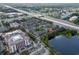 Aerial view highlighting condo location near lake and highway at 127 Oyster Bay Cir # 110, Altamonte Springs, FL 32701