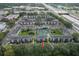 Aerial view showcasing the condo complex near a lake at 127 Oyster Bay Cir # 110, Altamonte Springs, FL 32701