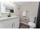 Bathroom with white vanity, quartz countertop, and black matte fixtures at 127 Oyster Bay Cir # 110, Altamonte Springs, FL 32701