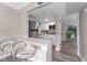 Modern kitchen with white cabinets, quartz countertops, and stainless steel appliances at 127 Oyster Bay Cir # 110, Altamonte Springs, FL 32701
