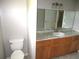 Clean bathroom with vanity, sink and toilet at 896 N 9Th St, Eagle Lake, FL 33839