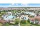 Large community pool with water features and surrounding amenities at 1536 Maidstone Ct, Davenport, FL 33896