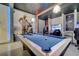Game room features a pool table, Star Wars mural, and gaming chairs at 1536 Maidstone Ct, Davenport, FL 33896