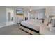 Main bedroom with king-size bed, TV, and ensuite bathroom access at 1536 Maidstone Ct, Davenport, FL 33896