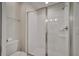 Clean bathroom with a toilet and a large shower at 1536 Maidstone Ct, Davenport, FL 33896
