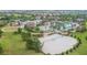 Expansive community pool and sandy beach volleyball court at 1536 Maidstone Ct, Davenport, FL 33896