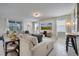 Spacious living room with large sectional sofa and plenty of natural light at 1536 Maidstone Ct, Davenport, FL 33896