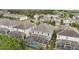 Aerial view of houses featuring backyard pools at 1536 Maidstone Ct, Davenport, FL 33896