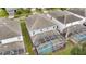 Aerial view showcasing a house with a screened pool at 1536 Maidstone Ct, Davenport, FL 33896