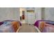 Twin bedroom with Frozen bedding and dresser at 1536 Maidstone Ct, Davenport, FL 33896