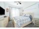 Guest bedroom with a queen-size bed and neutral decor at 2918 Sunset Retreat Ct, Kissimmee, FL 34747