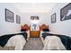 Twin bedroom with decorative accents and window seating at 2918 Sunset Retreat Ct, Kissimmee, FL 34747