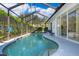 Inviting kidney-shaped swimming pool with a spa at 2918 Sunset Retreat Ct, Kissimmee, FL 34747