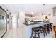 Modern kitchen with breakfast bar and stainless steel appliances at 2918 Sunset Retreat Ct, Kissimmee, FL 34747