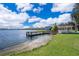 Relaxing gazebo by the lake with scenic views and peaceful atmosphere at 2918 Sunset Retreat Ct, Kissimmee, FL 34747