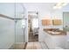 Simple bathroom with walk-in shower and granite vanity at 2918 Sunset Retreat Ct, Kissimmee, FL 34747