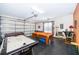Fun game room with air hockey and billiard table at 2918 Sunset Retreat Ct, Kissimmee, FL 34747