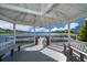 Gazebo with lake views and benches for relaxing at 2918 Sunset Retreat Ct, Kissimmee, FL 34747