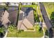 Property with solar panels and private pool, viewed from above at 2918 Sunset Retreat Ct, Kissimmee, FL 34747