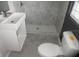 Updated bathroom with a white toilet and vanity at 896 N 9Th St, Eagle Lake, FL 33839