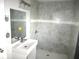 Clean bathroom with a shower/tub combo and a vanity with sink at 896 N 9Th St, Eagle Lake, FL 33839