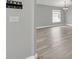 Bright dining room features gray walls, wood-look floors, and a chandelier at 621 Knightsbridge Cir, Davenport, FL 33896