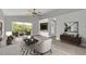 Spacious living area with large sliding glass doors and wood-look floors at 621 Knightsbridge Cir, Davenport, FL 33896
