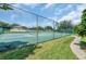 Community tennis courts with chain link fencing at 621 Knightsbridge Cir, Davenport, FL 33896