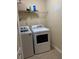 Laundry room with washer and dryer at 1816 Stargazer Trl, Kissimmee, FL 34758