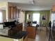 Eat-in kitchen with stainless steel appliances and granite countertops at 1816 Stargazer Trl, Kissimmee, FL 34758