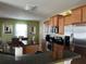 Spacious kitchen with stainless steel appliances and an island at 1816 Stargazer Trl, Kissimmee, FL 34758