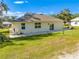 House exterior showcasing backyard, patio and landscaping at 2909 Annalee Rd, St Cloud, FL 34771