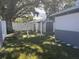 Backyard with shed, fence, and large tree at 3000 Cashmere Dr, Orlando, FL 32827