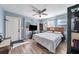 Bedroom with a queen bed and exterior access at 402 Tuscarora St, Lakeland, FL 33805