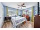 Charming bedroom with a full-size bed and plenty of light at 402 Tuscarora St, Lakeland, FL 33805
