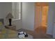 Bedroom with a queen-size bed, nightstand, and a view of the bathroom at 608 Copeland Dr, Haines City, FL 33844