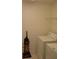 Laundry room with washer, dryer, and storage at 608 Copeland Dr, Haines City, FL 33844