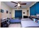 bedroom with twin beds and built-in shelving at 725 Michigan Ct # 3, St Cloud, FL 34769