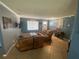 Bright living room with hardwood floors and comfortable seating at 1615 Martinsville Ct, Orlando, FL 32825